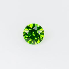 0,10 ct, Piccolo granato demantoide russo sfaccettato di colore verde vivo