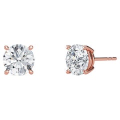 0.10 Carat TW Natural Diamond 14k Gold Four Prong Stud Earring