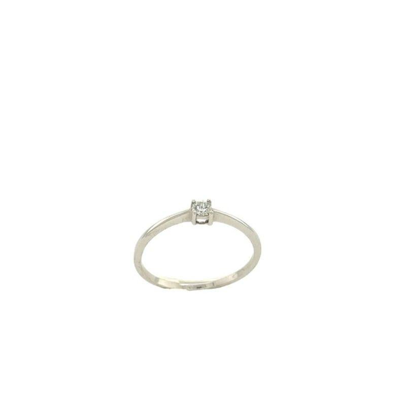 18ct White Dainty Fine Quality Solitaire Diamond Ring Set With 0.10ct Diamonds

Additional Information:
Total Diamond Weight: 0.10ct
Diamond Colour: F
Diamond Clarity: Si
Total Weight: 1.3g 
Ring Size: O
SMS4554