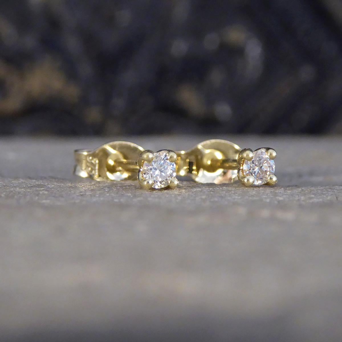 The perfect pair of stud earrings for everyday wear in the earlobe, and ideal for a second piercing. Each stud is set with a Round Brilliant Cut Diamond, matching well in colour and clarity and weighing a total of 0.10ct. Each Diamond sits in a 9ct