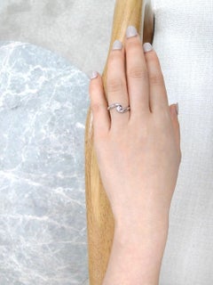 0.10ct Round Brilliant Cut Diamond Solitaire Engagement Twist Tension Ring