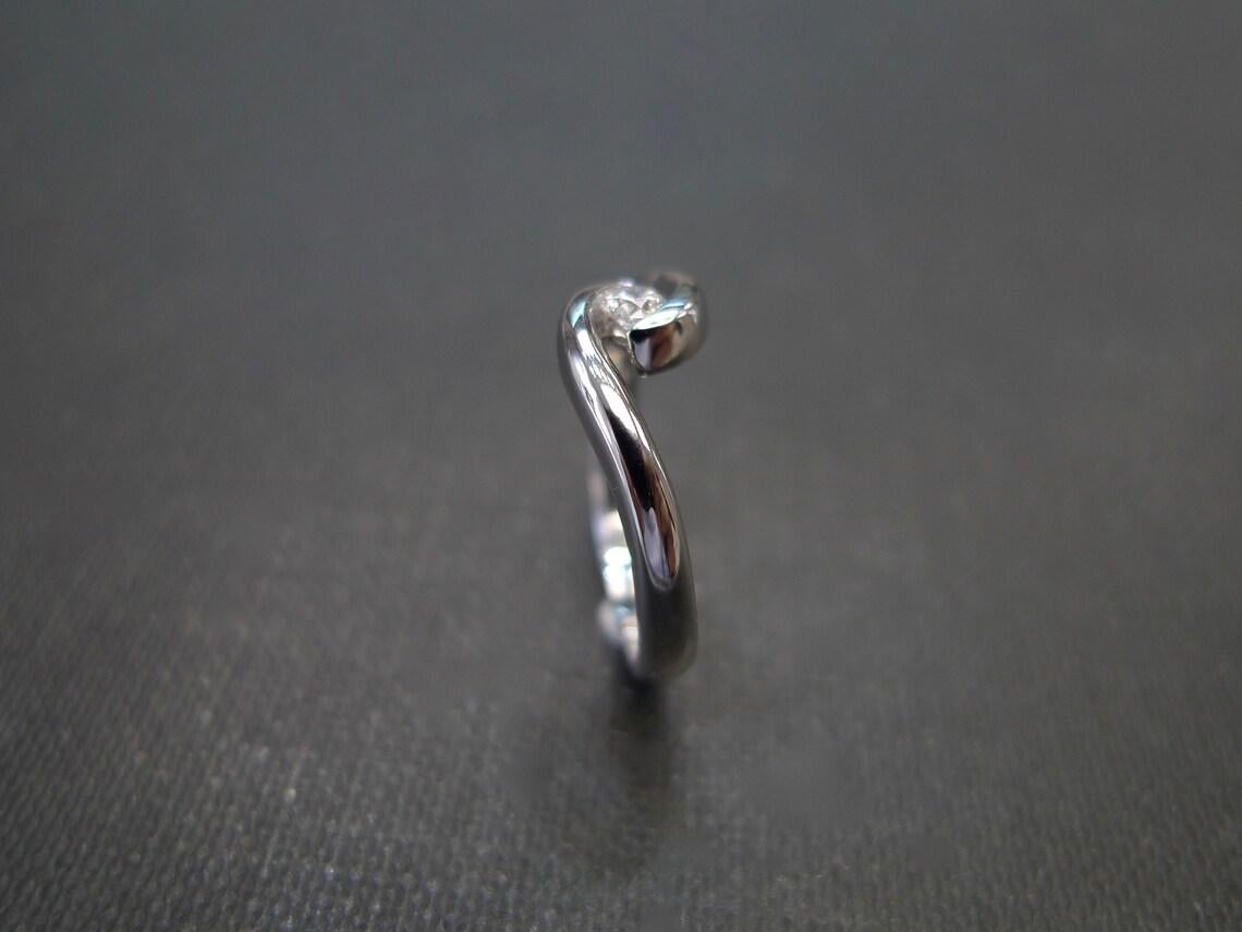 For Sale:  0.10ct Round Brilliant Cut Diamond Solitaire Engagement Twist Tension Ring 6