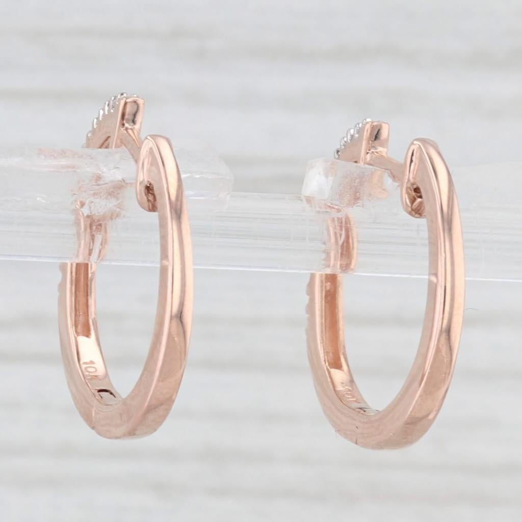Gemstone Information:
- Natural Diamonds -
Total Carats - 0.10ctw
Cut - Single
Color - G - H
Clarity - SI2 - I1

Metal: 10k Rose Gold 
Weight: 2.6 Grams 
Stamps: 10k
Closure: Hinged with snap top posts
Measurements: 16.6 x 1.8 mm
