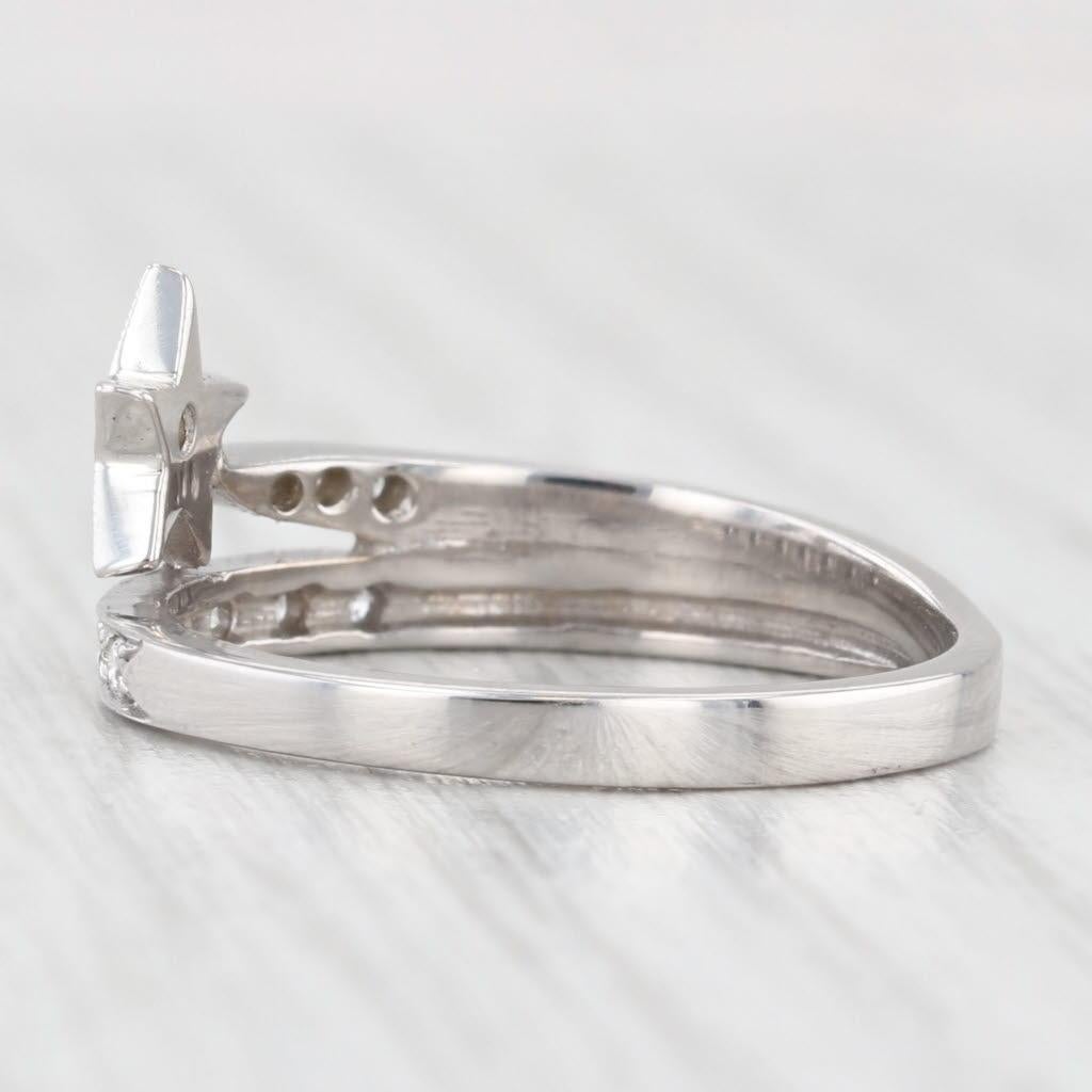 Gemstone Information:
- Natural Diamonds -
Total Carats - 0.10ctw
Cut - Round Brilliant
Color - E - F
Clarity - SI1 - SI2

Metal: 14k White Gold 
Weight: 3.6 Grams 
Stamps: 14k 585
Face Height: 10 mm 
Rise Above Finger: 2 mm
Band / Shank Width: 2.4