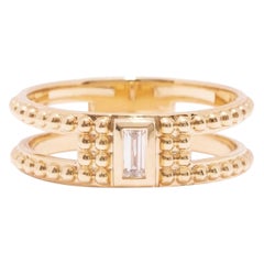 Anello con diamante baguette da 0,11 carati in oro giallo 14K, misura 7 US