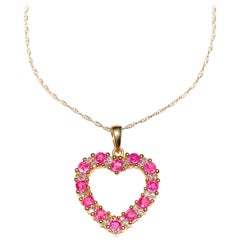 0.11 Carat Diamond 1 Carat Ruby 14 Karat Yellow Gold Heart Shape Pendant Jewelry