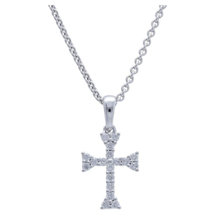 Pendentif croix en or blanc 14 carats et diamants 0,11 carat