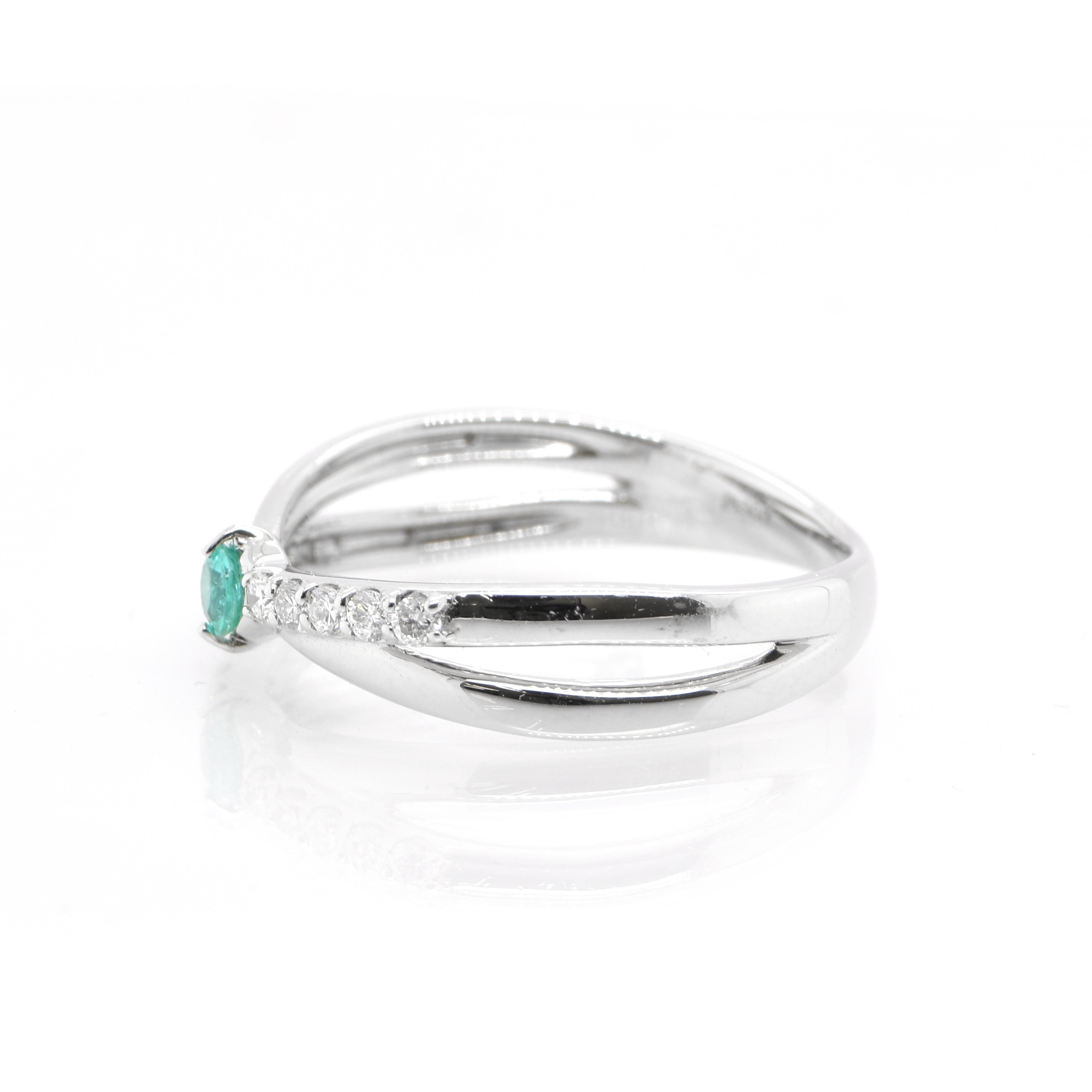 A beautiful Engagement Ring featuring a 0.11 Carat Natural Paraiba Tourmaline and 0.15 Carats of Diamond Accents set in Platinum. Paraiba Tourmalines were only discovered 30 years ago in the Brazilian state of the same name- Paraiba. Since then they