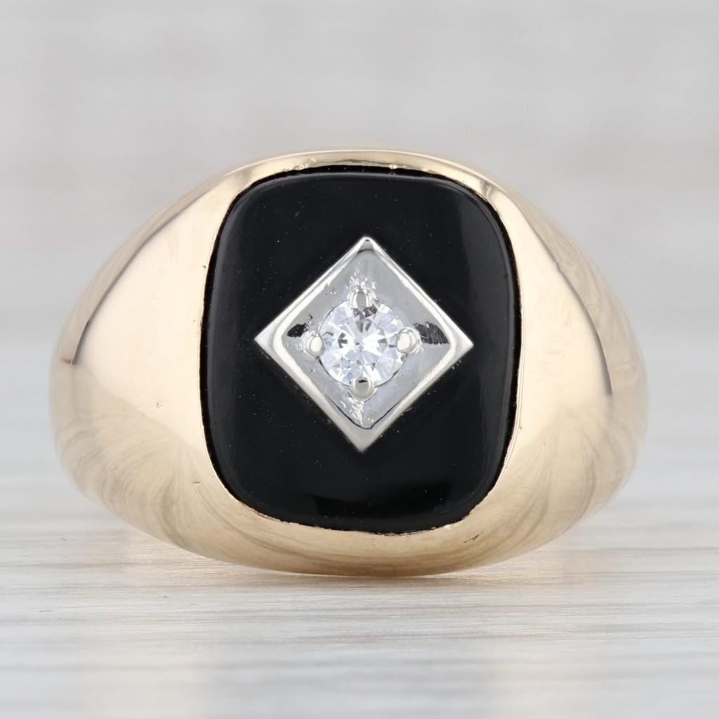 Gemstone Information:
- Natural Diamond -
Carats - 0.11ctw
Cut - Round Brilliant
Color - F - G
Clarity - VS2

- Natural Onyx -
Size - 11.5 x 13.5 mm 
Cut - Cushion Cabochon
Color - Black
Treatment - Dyed

Metal: 10k Yellow Gold, White Gold Diamond