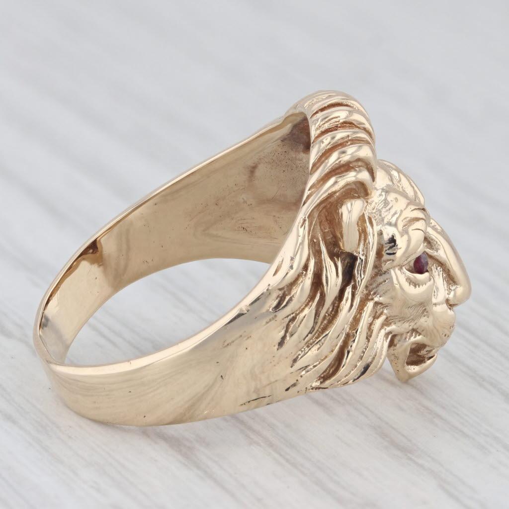 Gemstone Information:
- Natural Rubies -
Total Carats - 0.06ctw
Cut - Round
Color - Red
Treatment - routinely Enhanced 

- Natural Diamonds -
Total Carats - 0.05ctw
Cut - Round Brilliant
Color - H - I
Clarity - I1 

Metal: 10k Yellow Gold
Weight: