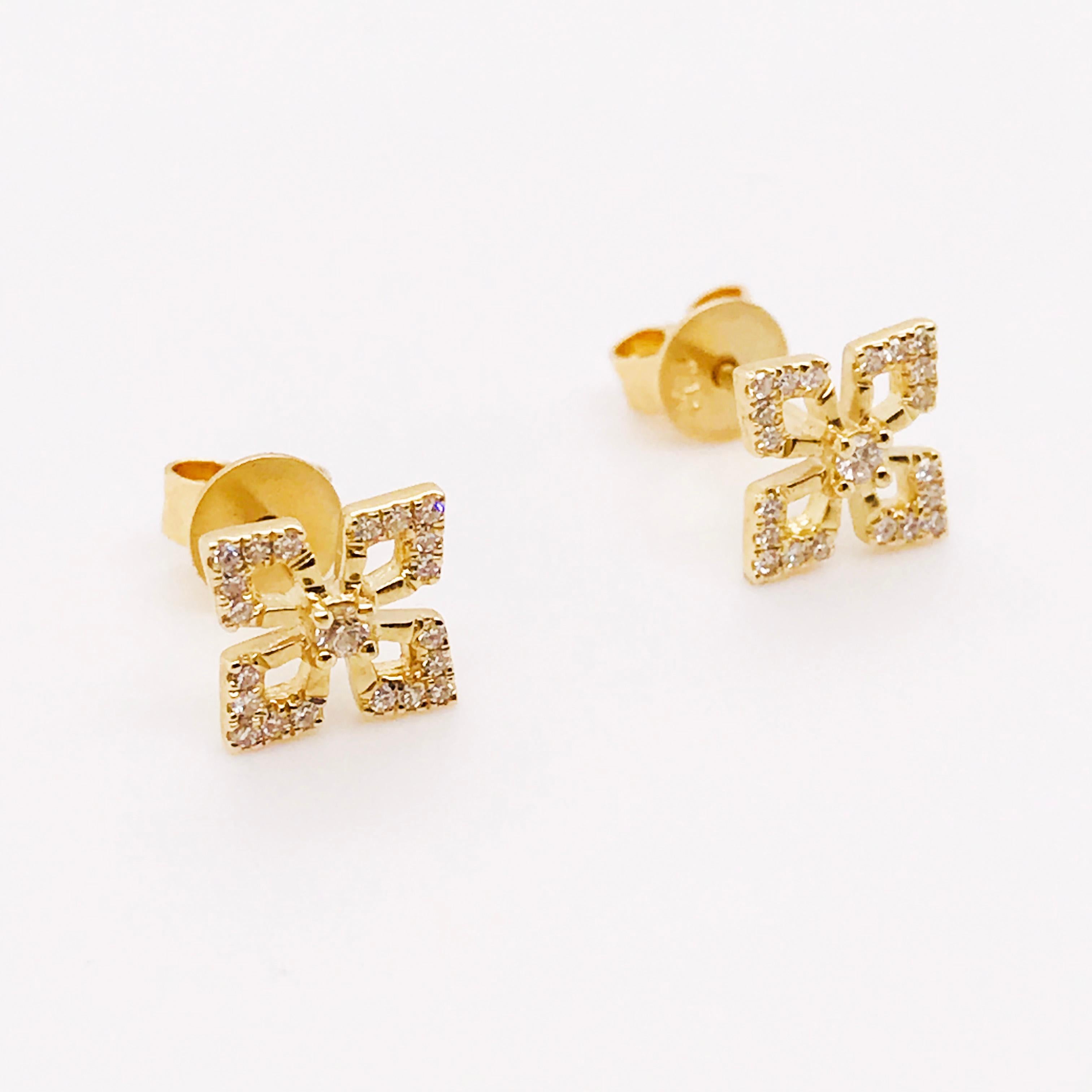 These diamond earrings are unique and gold. The design is a geometric clover (or petal) paved in round brilliant diamonds. These are a great accent piece to any fine jewelry attire. The size of these diamond studs can easily been worn on their own
