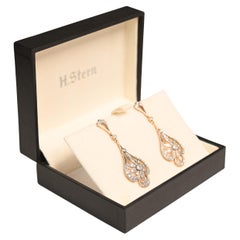 Boucles d'oreilles en or jaune 18 carats avec diamants de taille transitionnelle (environ 0,10 carat