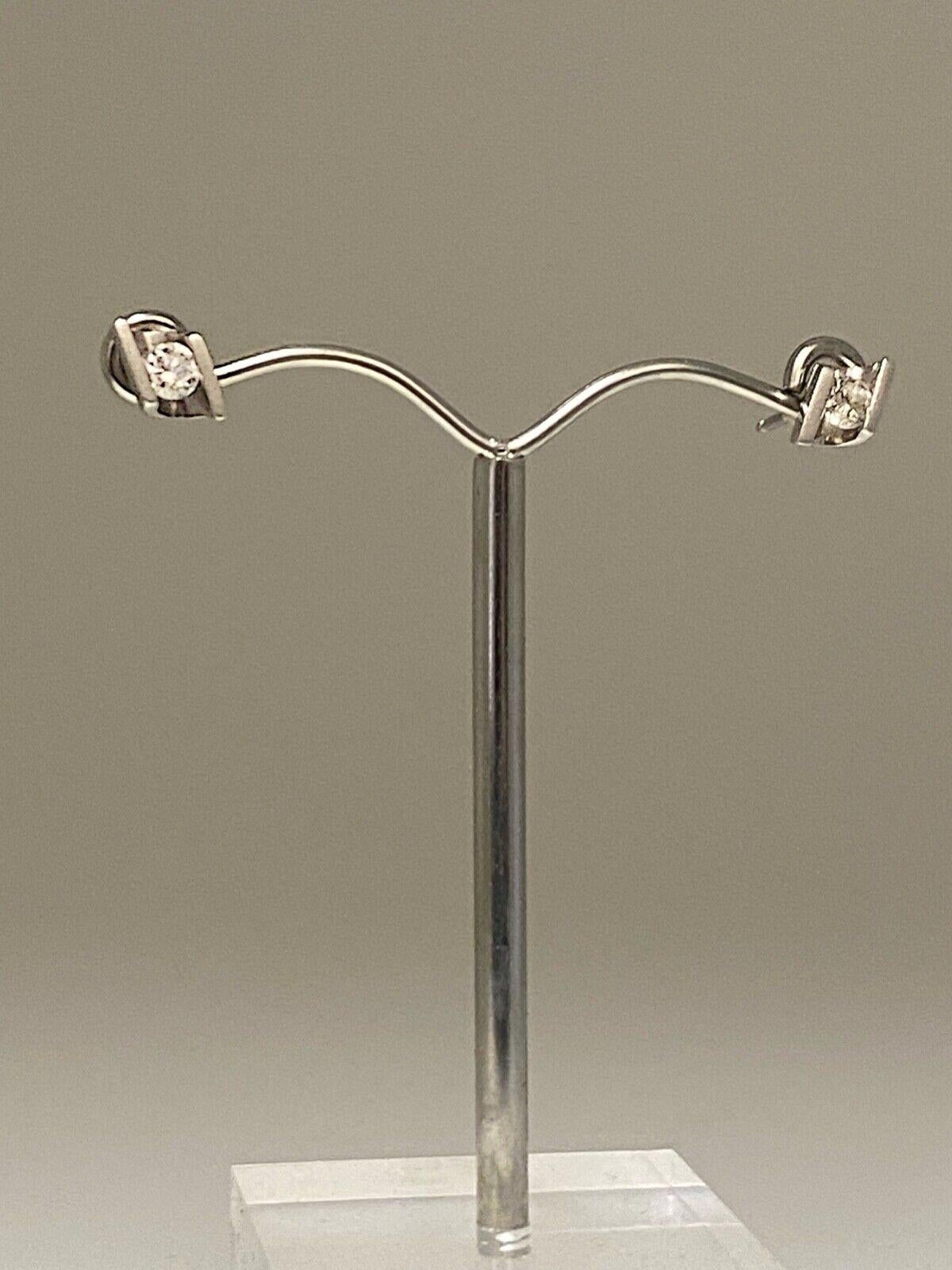 0,12ct Diamant-Ohrstecker aus Platin 900. Farbe: G, Reinheit: VS. (Rundschliff)