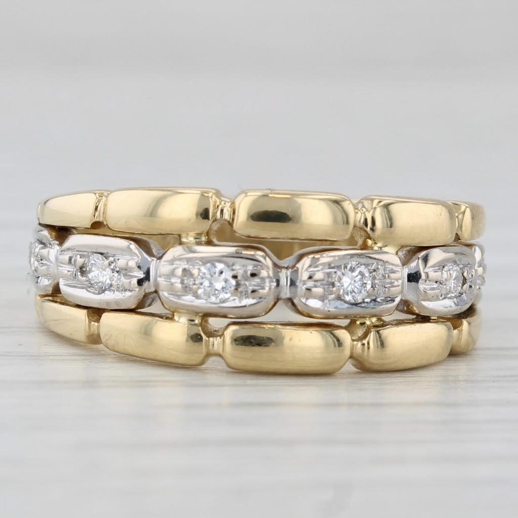Gemstone Information:
- Natural Diamonds -
Total Carats - 0.12ctw
Cut - Round Brilliant
Color - G - H
Clarity - VS2 - SI1

Metal: 18k Yellow & White Gold
Weight: 6 Grams 
Stamps: 750
Face Height: 8.3 mm 
Rise Above Finger: 2.5 mm
Band / Shank Width: