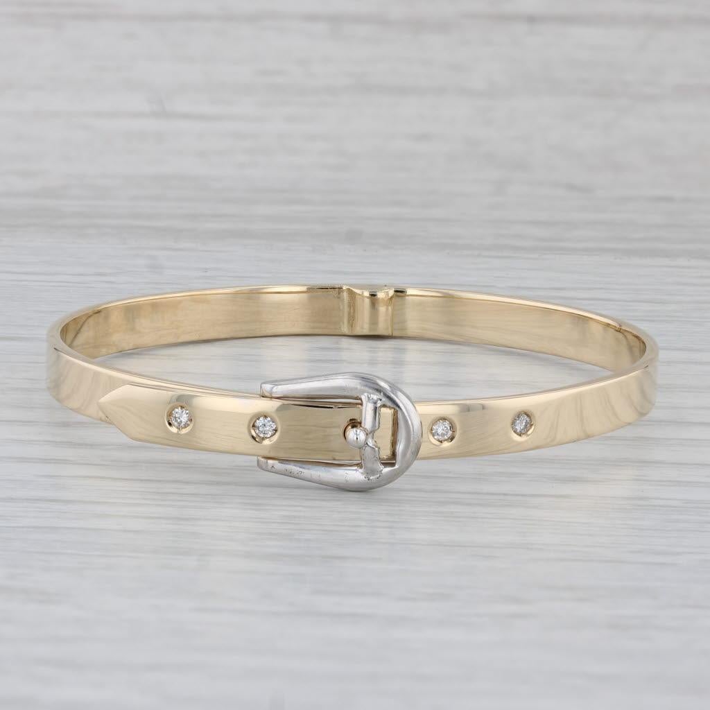 Gemstone Information:
- Natural Diamonds -
Total Carats - 0.12ctw
Cut - Round Brilliant
Color - H - I
Clarity - SI2 - I1

Metal: 14k Yellow & White Gold 
Weight: 19.6 Grams 
Stamps: 14k
Style: Bangle
Closure: Hinged Snap Clasp
Inner Circumference: 6