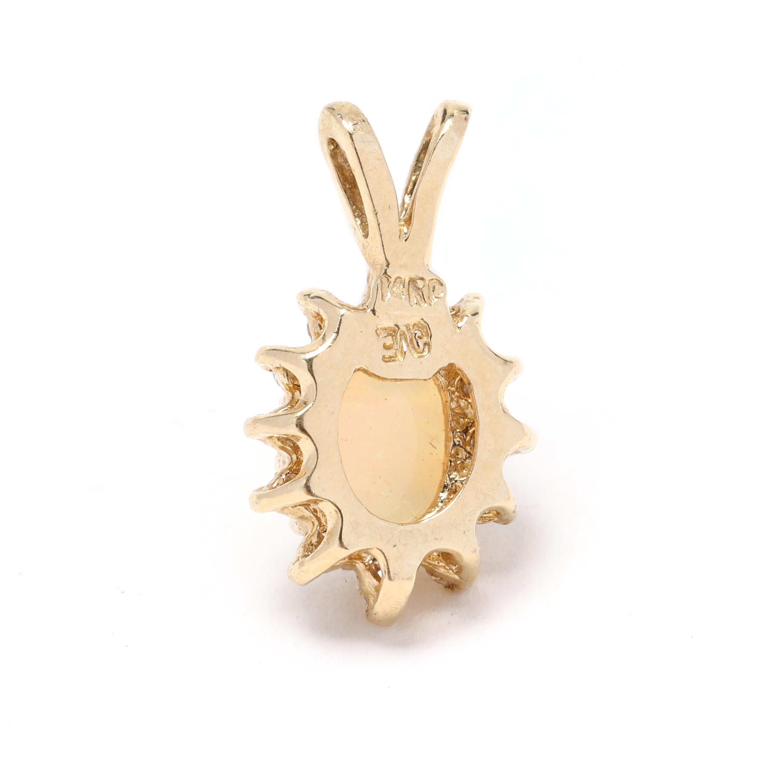 This 14k yellow gold diamond and opal pendant is a beautiful and eye-catching piece of jewelry. Crafted with high-quality gold, this pendant features a dainty design that adds a touch of elegance to any outfit. The pendant showcases a stunning opal