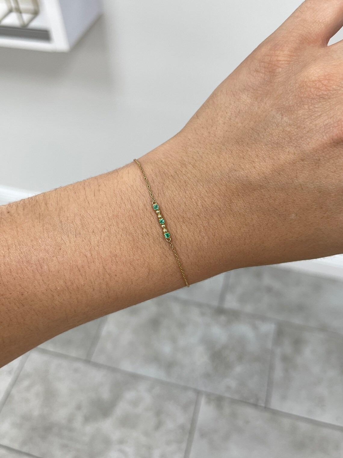 0.12tcw 14K Natural Medium Green Round Emerald Bead Bar Prong Set Bracelet For Sale 1