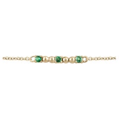 0.12tcw 14K Natural Medium Green Round Emerald Bead Bar Prong Set Bracelet