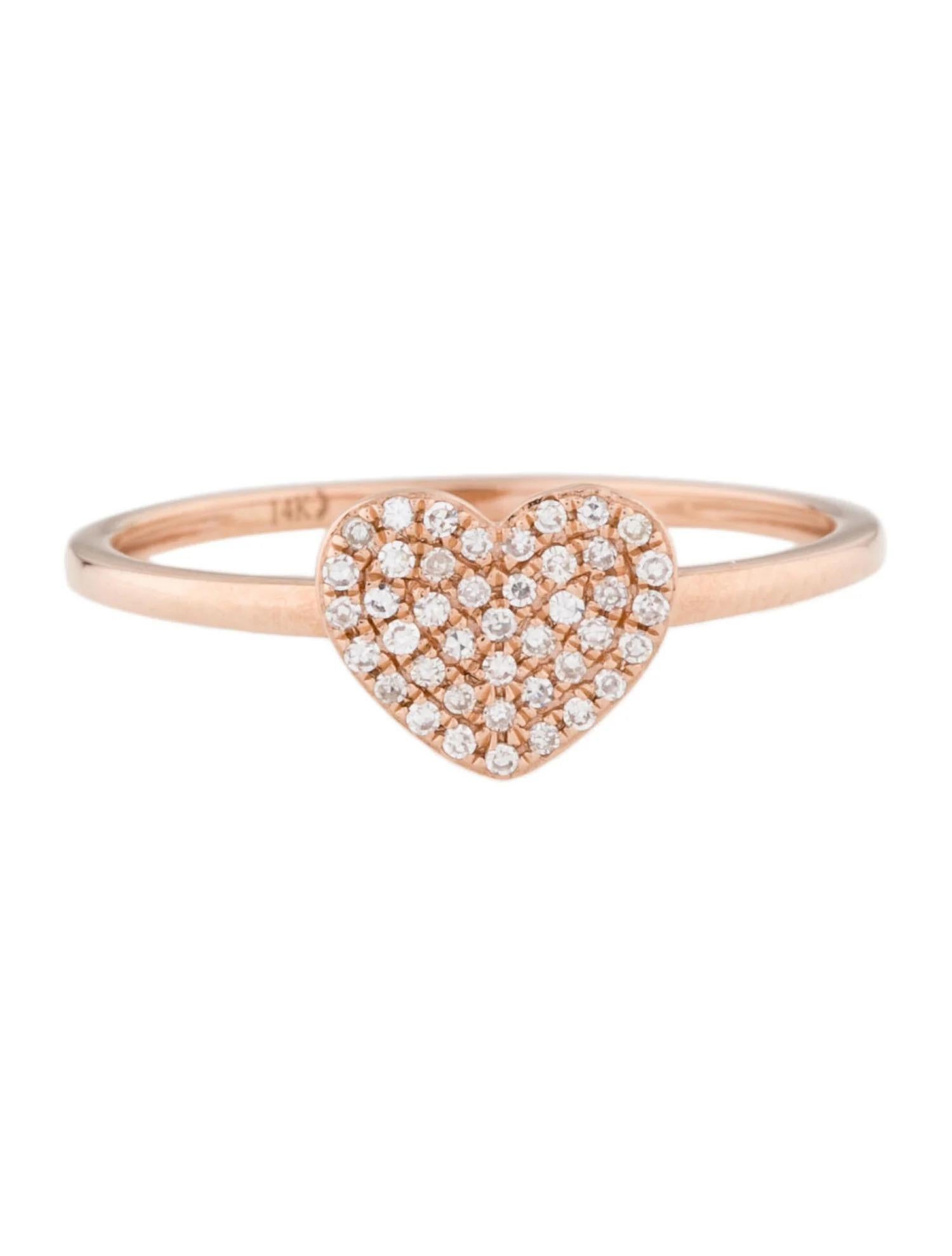 This stunning ring features a beautiful Heart Cluster of White Diamonds,.
This ring is set in 14K Rose Gold. Total Diamond Weight = 0.13 Carats. Ring Size is 6 1/2.