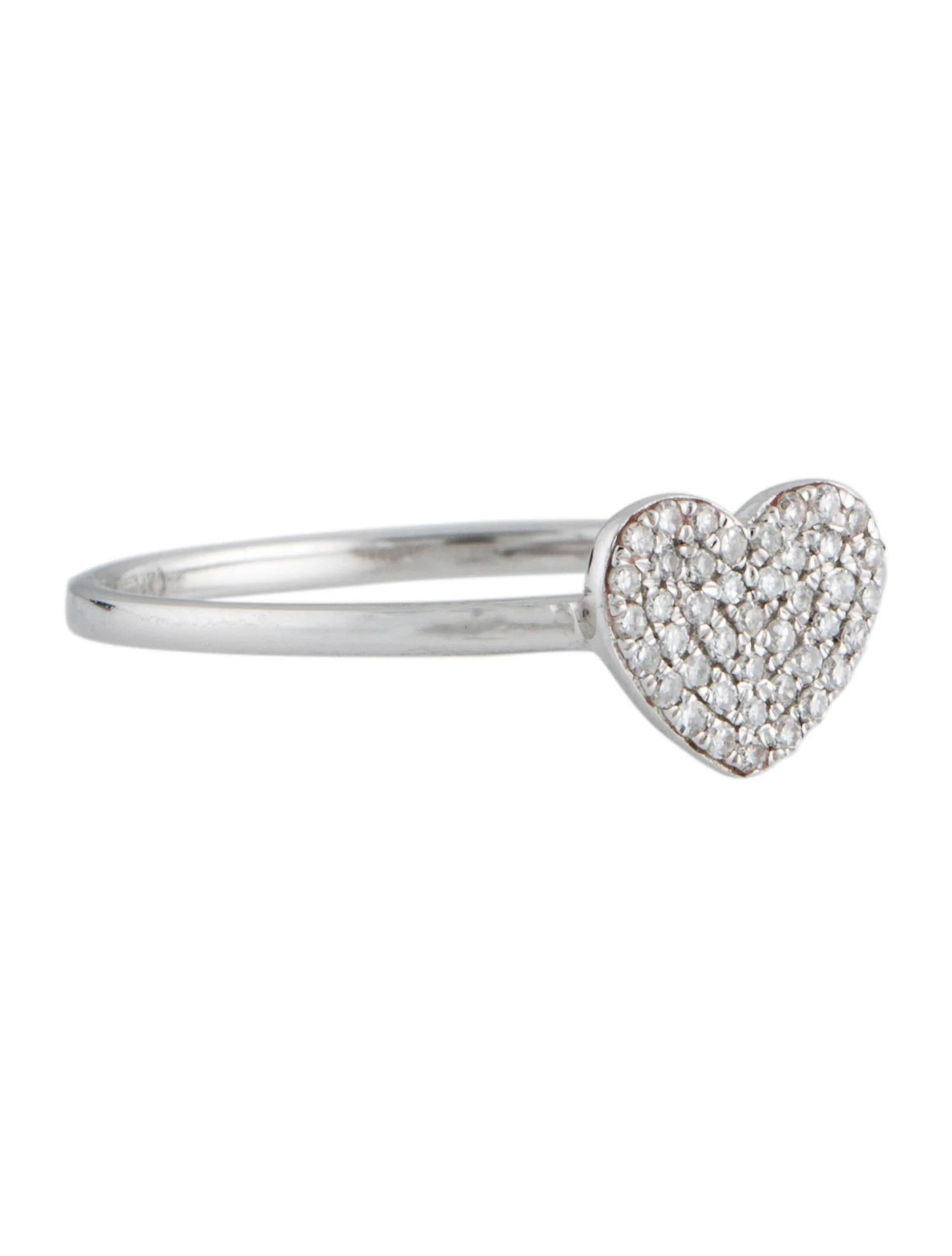 This stunning ring features a beautiful Heart Cluster of White Diamonds,.
This ring is set in 14K White Gold. Total Diamond Weight = 0.13 Carats. Ring Size is 6 1/2.