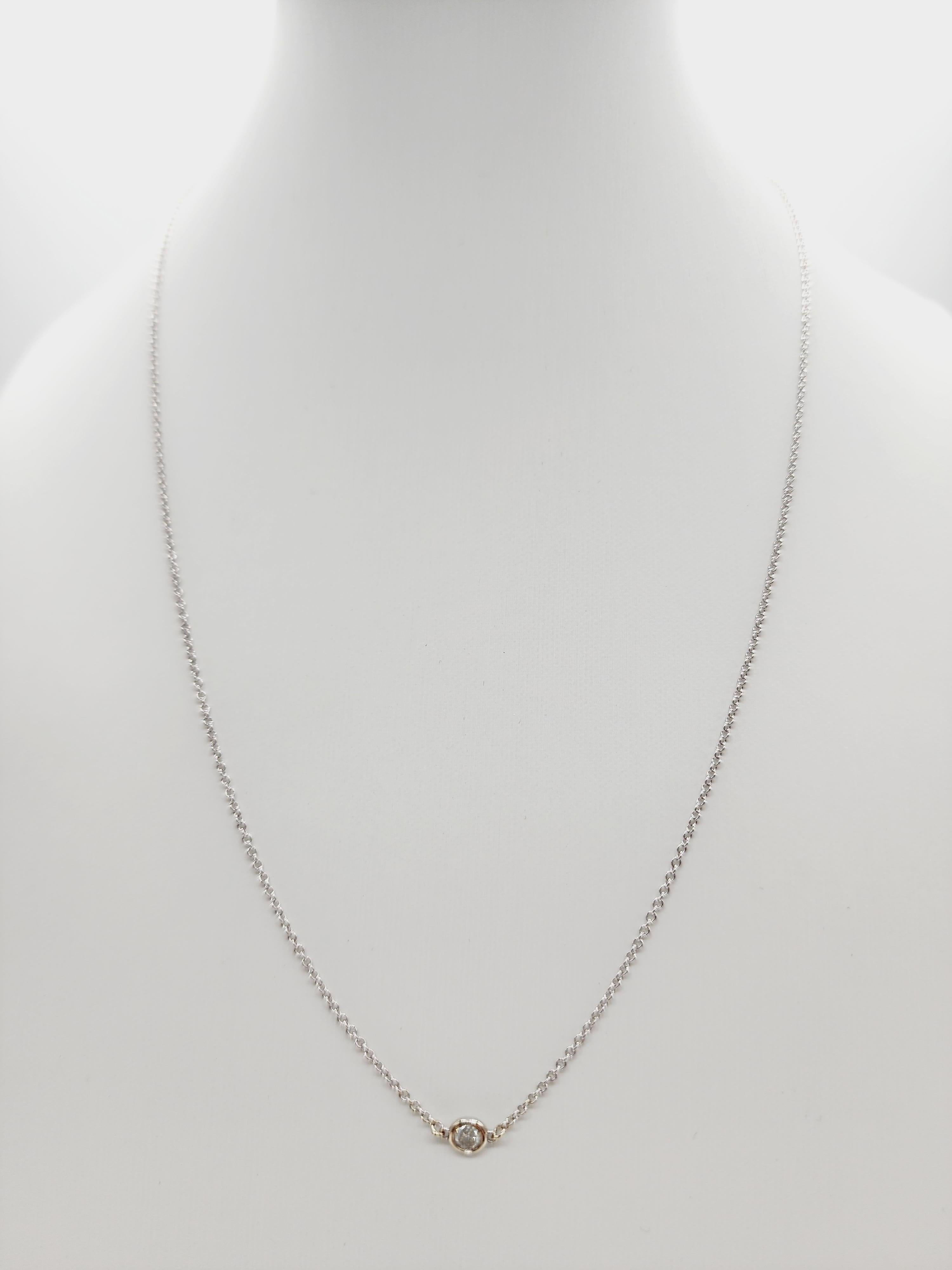 Single Station Diamond by the yard necklace set in Italian made 14K white gold. 
Total weight is 0.13 carats. Beautiful shiny natural diamond. 
Total length is 18 inch. Average Color/Clarity I/I