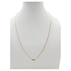 Collier en or jaune 14 carats avec un diamant unique de 0,13 carat