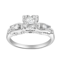 0.13 Carat Total Round Brilliant Cut Diamond Three-Stone Engagement Ring