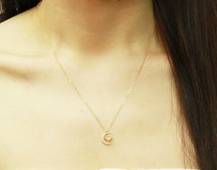 0.13 Round Cab Ethiopian Opal Diamond accents 14K Yellow Gold Pendant