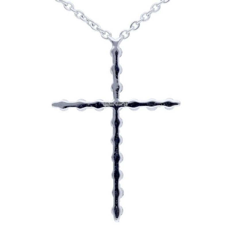     Diamond Carat Weight: This exquisite cross necklace features a total of 0.14 carats of diamonds. The necklace is adorned with 16 round-cut diamonds, carefully selected to provide a perfect balance of brilliance and elegance.

    Gold Type: