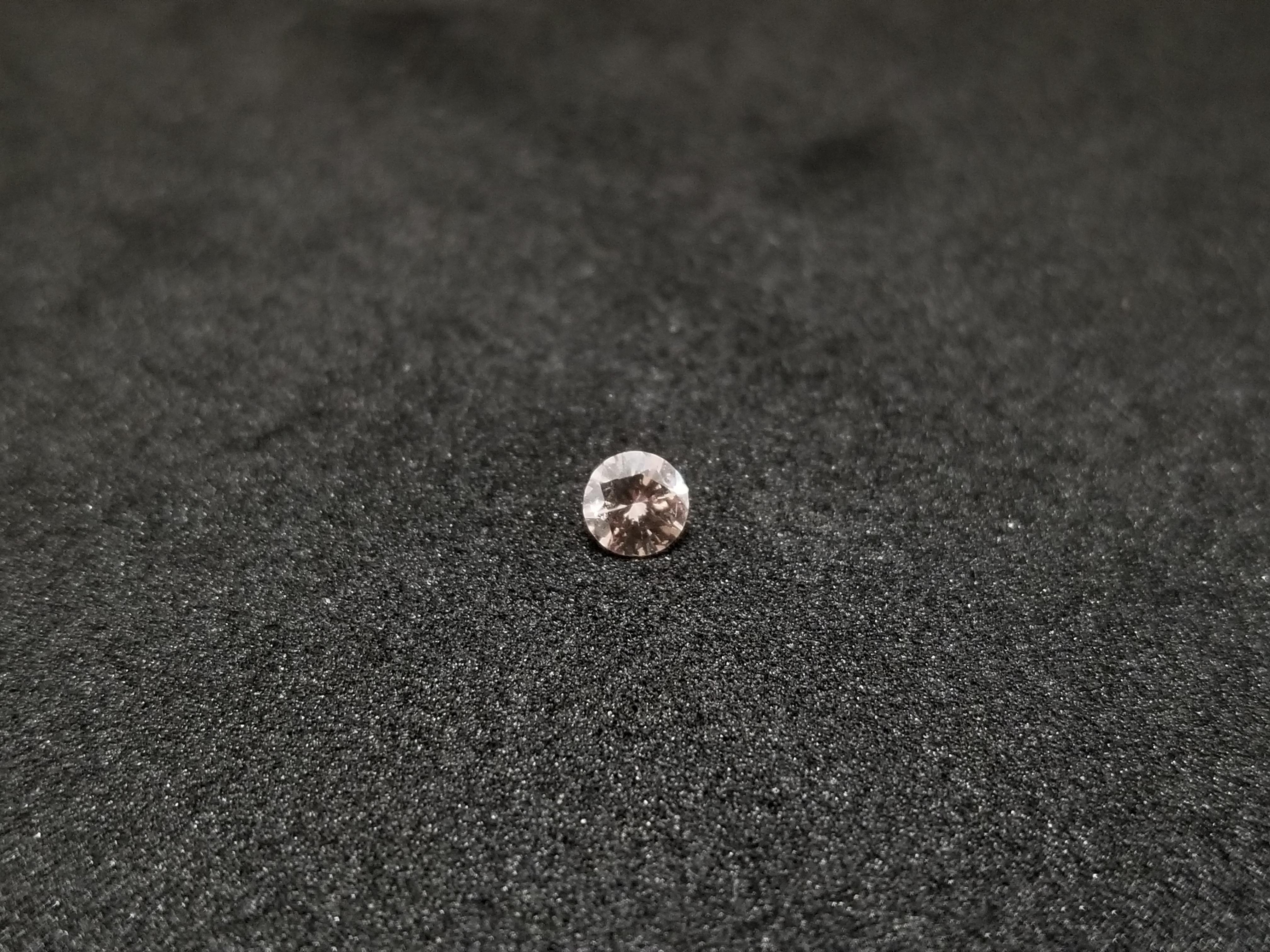 Natural fancy pink brown round shape diamond weighing 0.14 carats. 

*Free shipping within the U.S.*