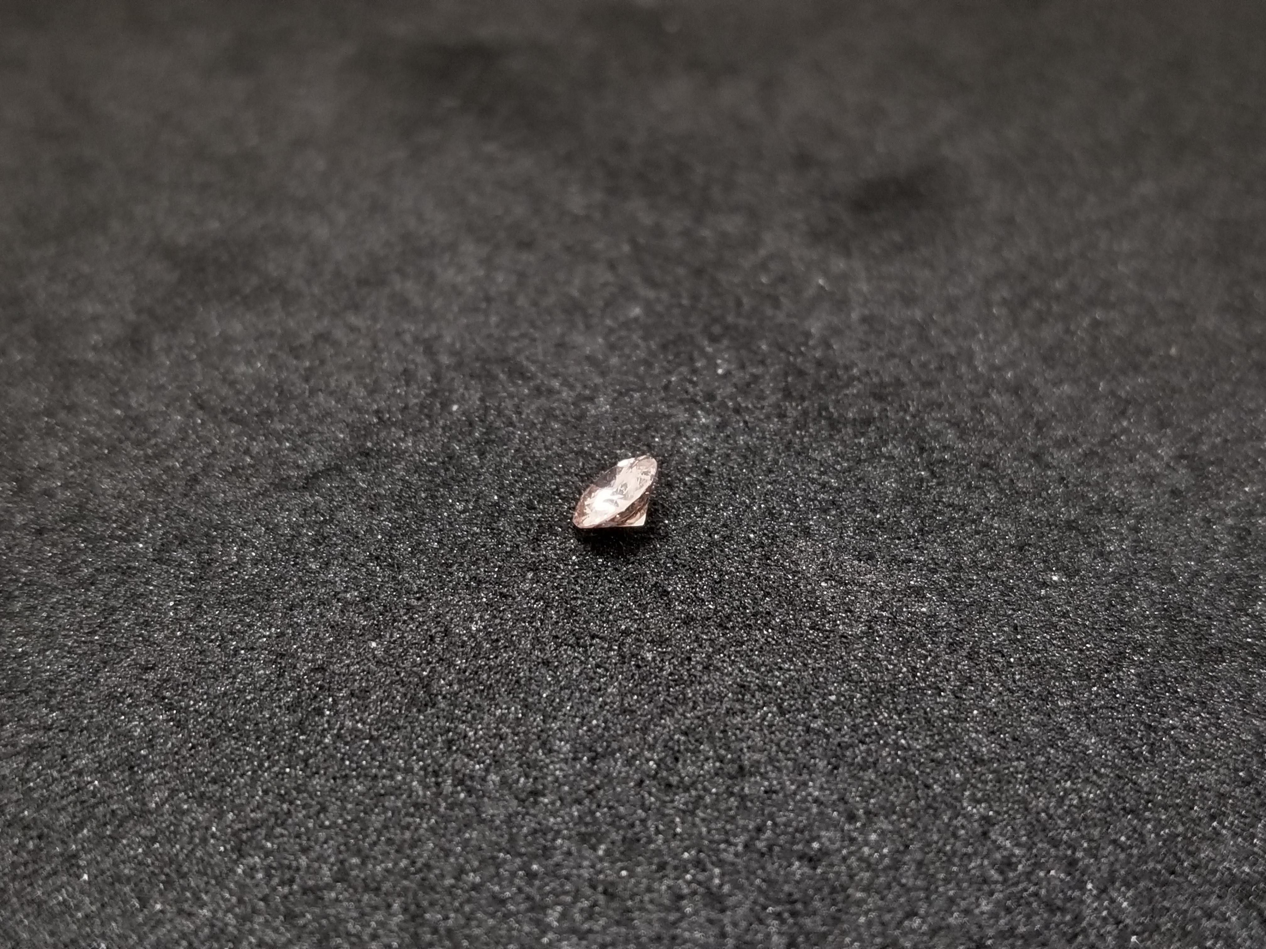 pink and brown gemstone