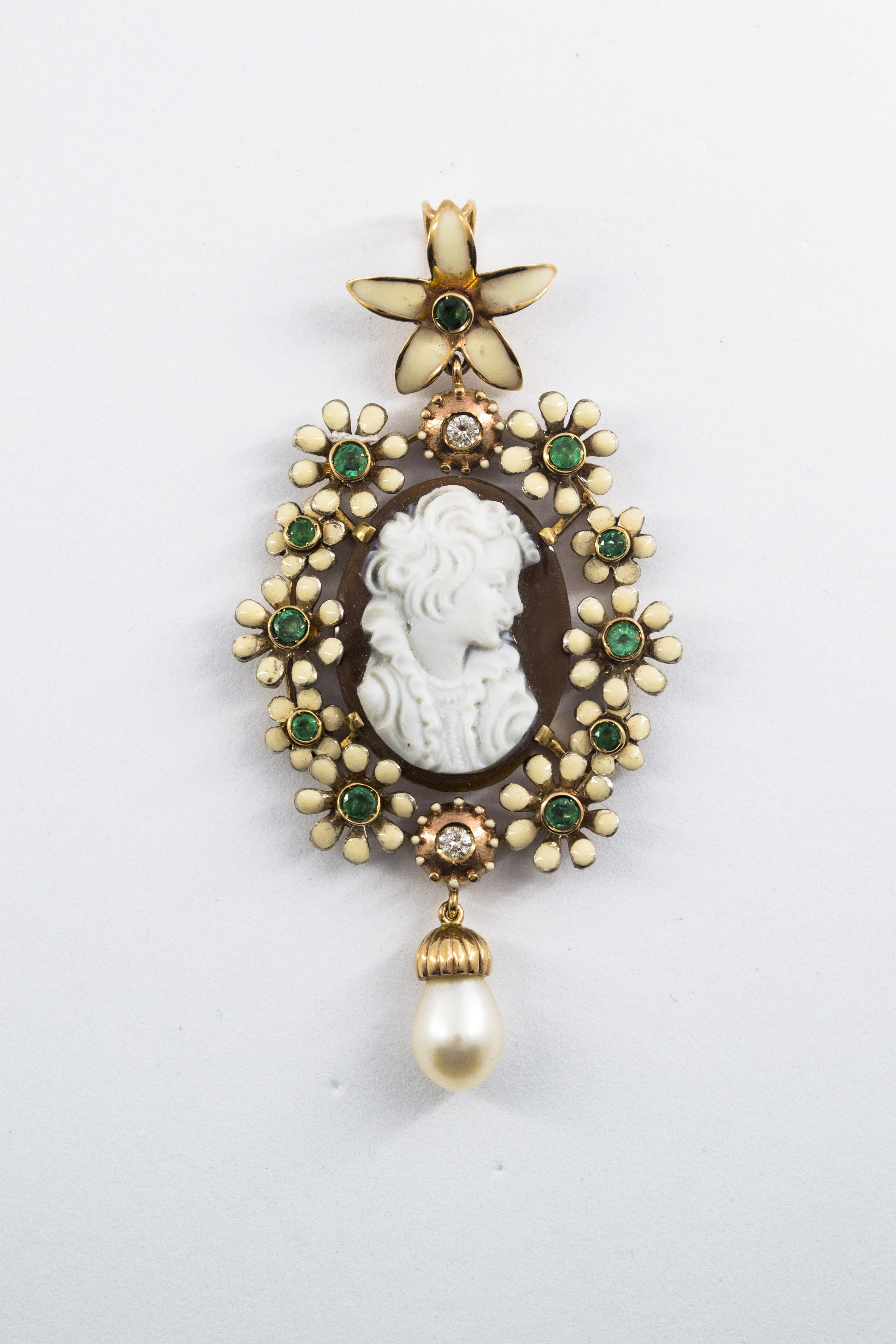 This Pendant is made of 9K Yellow Gold.
This Pendant has 0.14 Carats of White Diamonds.
This Pendant has 0.70 Carats of Emeralds.
This Pendant has also Enamel, Pearl and Carved Shell featuring the portrait of a lady.
We're a workshop so every piece