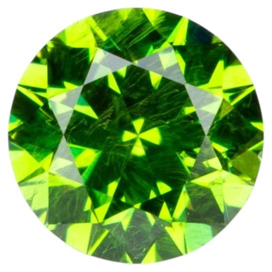 0.14 ct, Tiny vivid green faceted Russian demantoid garnet