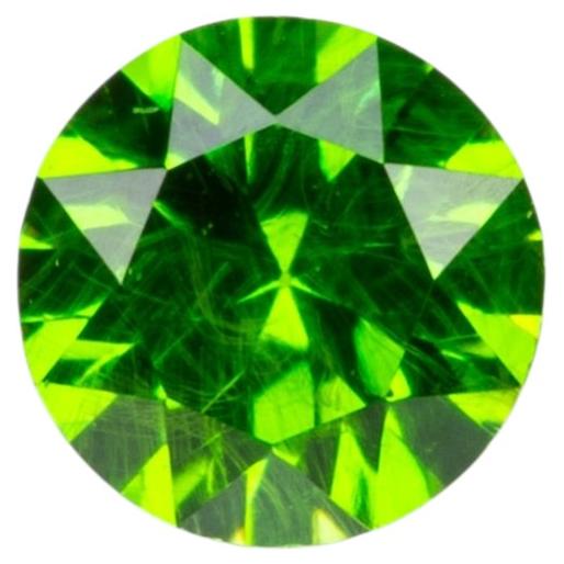 0.14 ct, Tiny vivid green faceted Russian demantoid garnet