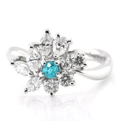 0.145 Carat Natural Paraiba Tourmaline and Diamond Ring Set in Platinum