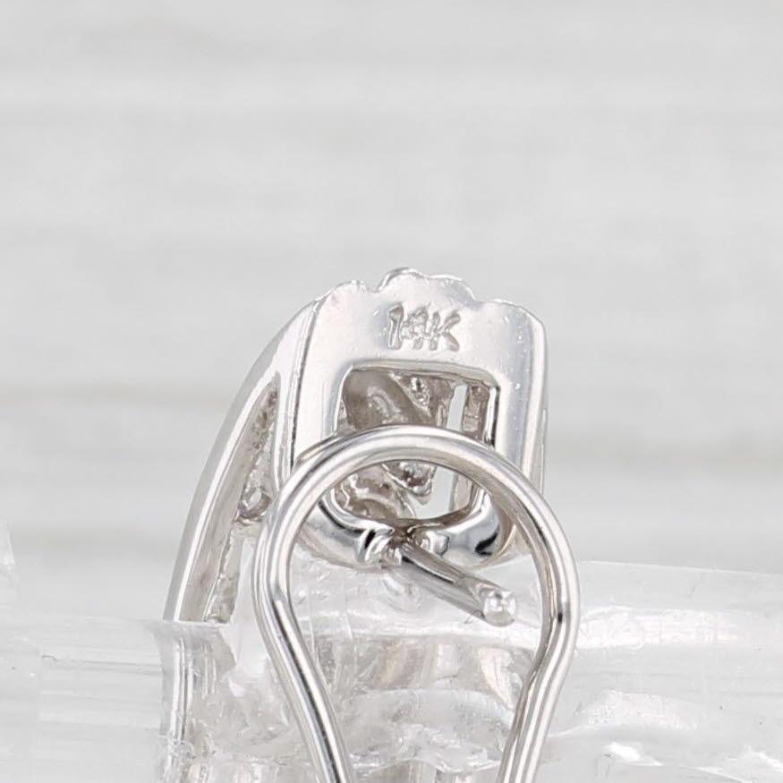 Gemstone Information:
- Natural Diamonds -
Total Carats - 0.14ctw
Cut - Single
Color - F - G
Clarity - I2 - I3

Metal: 14k White Gold
Weight: 5 Grams 
Stamps: 14k
Closure: Stick Posts & Omega Backs
Measurements: 20.5 x 7.7 mm