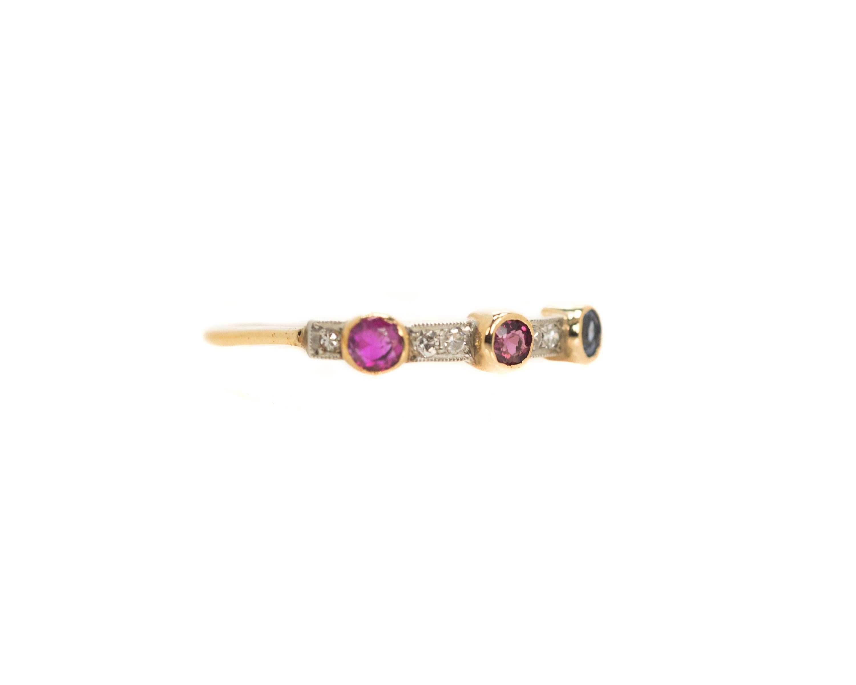 Stackable, 3 Stone, 14 Karat Two-Tone Gold, Colorful Gemstone Ring

This Stackable Ring features Colorful Gemstones set in 14K Yellow Gold and Diamonds set in 14K White Gold. The shank is crafted from 14K Yellow Gold. The rich yellow Gold