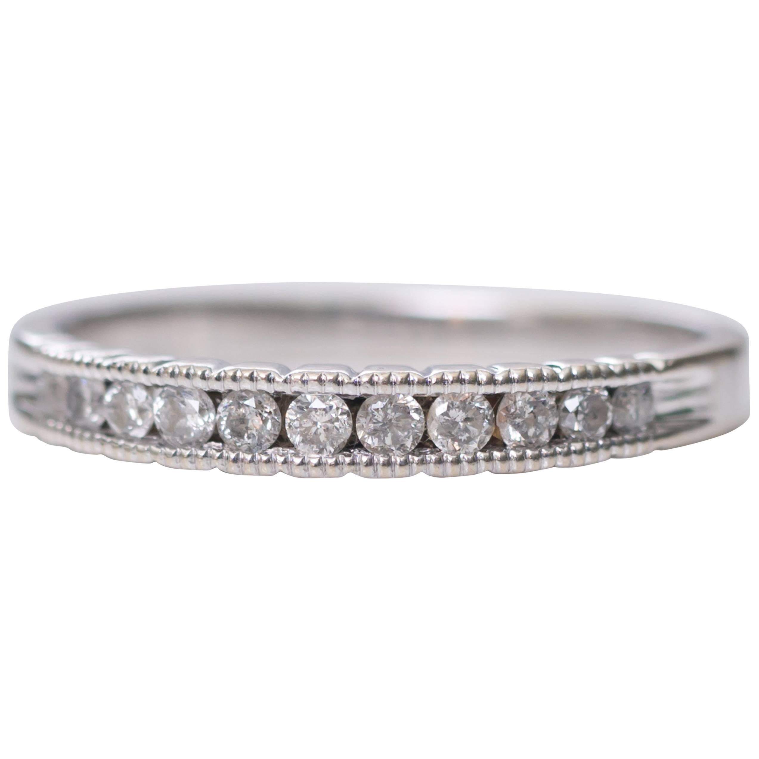 0.15 Carat Diamond and 14 Karat White Gold Eternity Band Ring