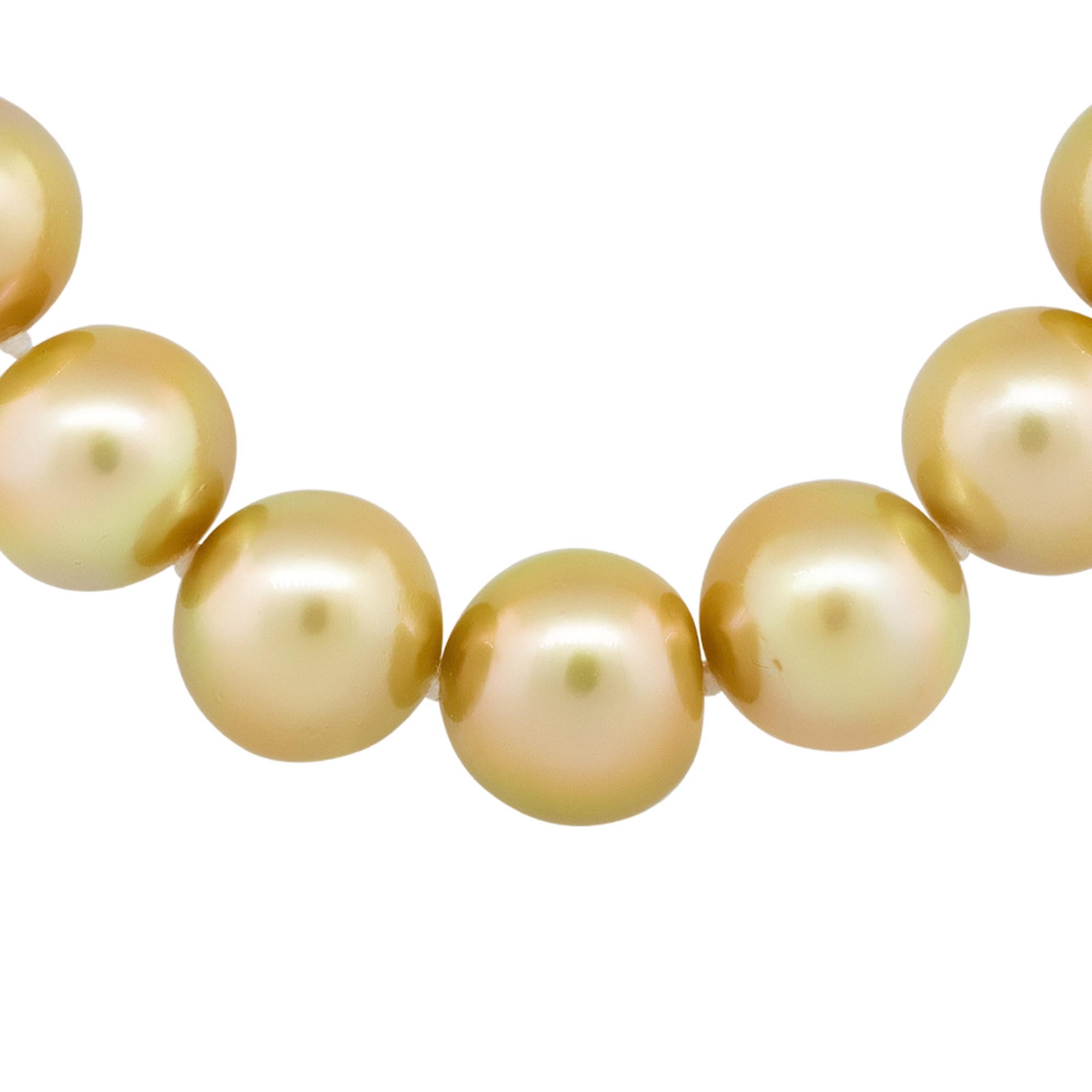Material: 18k Yellow gold
Pearl Details: 33 South Sea pearls measuring approx. 13.75mm
Clasp: 18k yellow gold clasp with approx. 0.15ctw of round cut Diamonds. Diamonds are G/H in color and SI in clarity
Total Weight: 105.8g (68dwt)
Length: