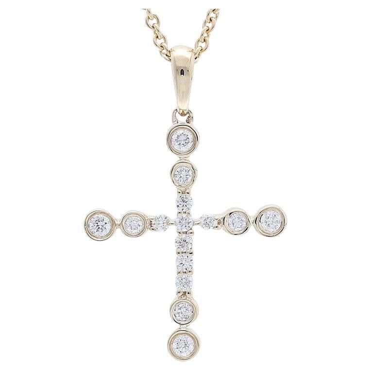 0.15 Carat Diamonds in 14K Yellow Gold Cross Pendant