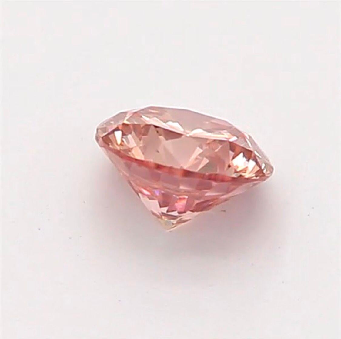 Women's or Men's 0.15 Carat Fancy Orangy Pink Round Shaped Diamond SI2 Clarity CGL Certified For Sale