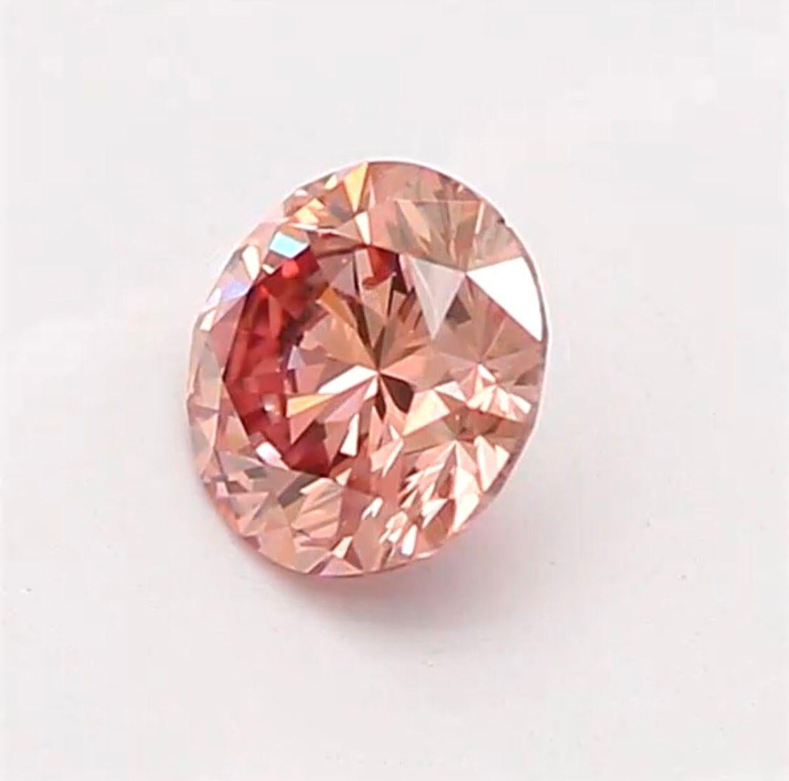 0.15 Carat Fancy Orangy Pink Round Shaped Diamond SI2 Clarity CGL Certified For Sale 2