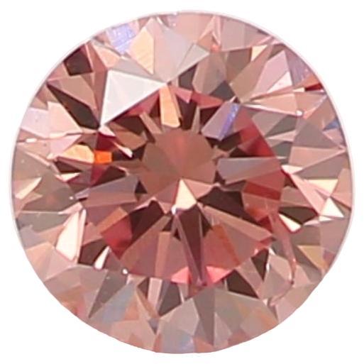 0.15 Carat Fancy Orangy Pink Round Shaped Diamond SI2 Clarity CGL Certified For Sale