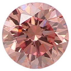 0.15 Carat Fancy Orangy Pink Round Shaped Diamond SI2 Clarity CGL Certified