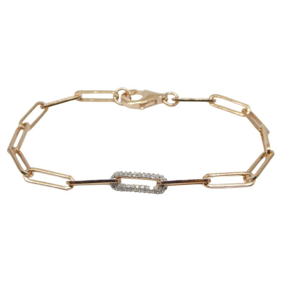 Introducing the 0.15ct Diamond Paperclip Chain Bracelet, a stunning piece of jewelry that effortlessly combines elegance and contemporary style. Crafted with meticulous attention to detail, this bracelet is set in 0.925 pink/rose gold vermeil,