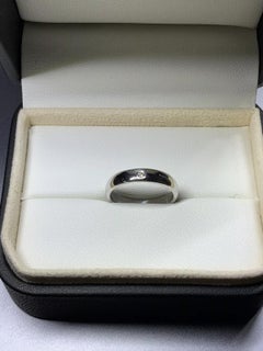 0.15ct Diamond solitaire unisex engagement ring 18ct white gold