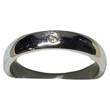 0.15ct Diamond solitaire unisex engagement ring 18ct white gold