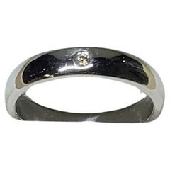 0.15ct Diamond solitaire unisex engagement ring 18ct white gold