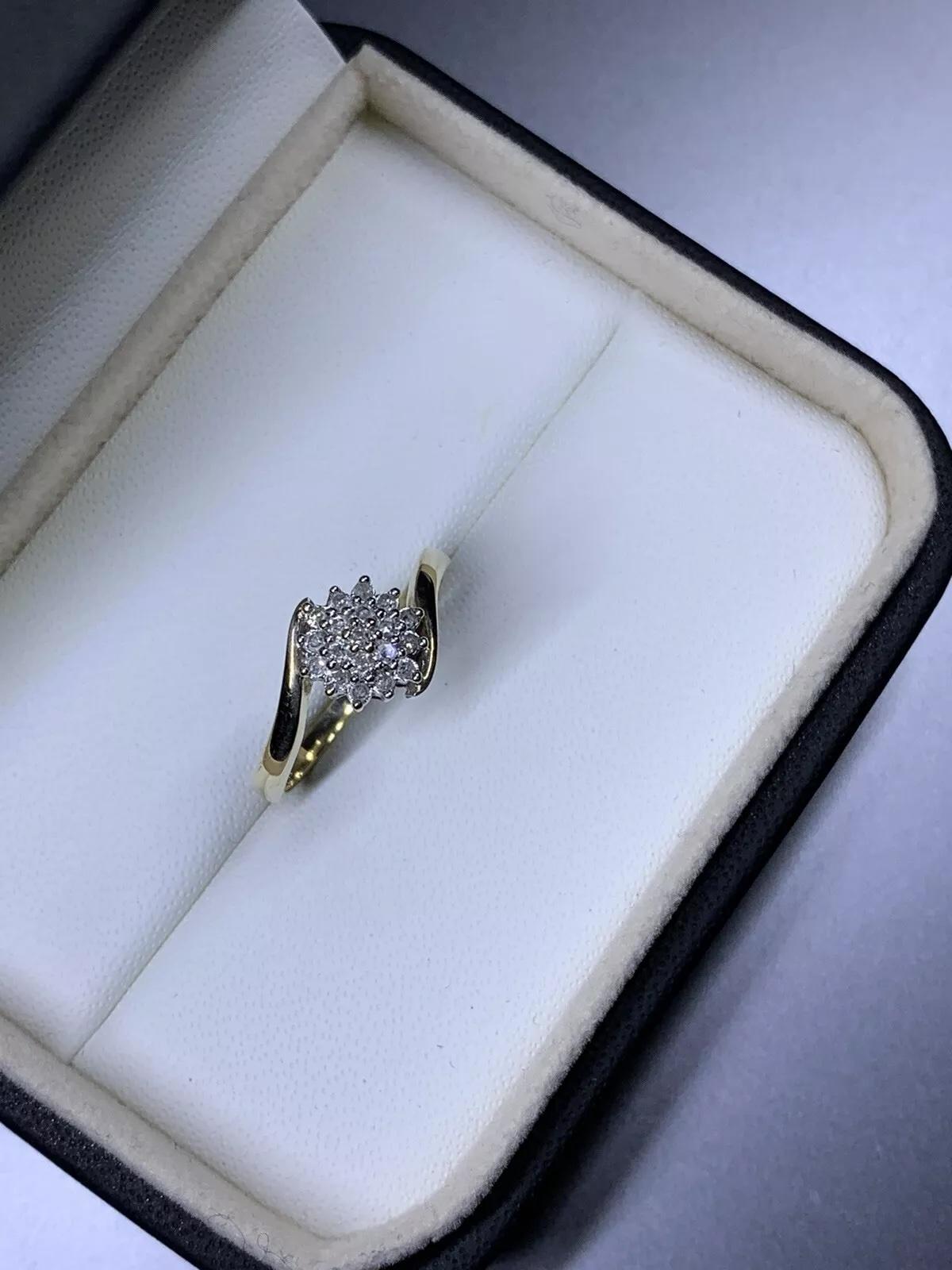 0.15ct Round diamond twisted engagement ring in 9ct yellow gold.

Twisted band diamond engaged ring in 9k yellow gold

Solitaire diamond ring 0.15ct diamond weight in plain 9ct yellow gold.

Hallmarked

The ring can be resized

Comes with a