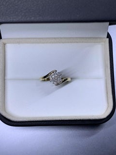 0.15ct Diamond twisted chunky solitaire engagement ring in 9ct yellow gold